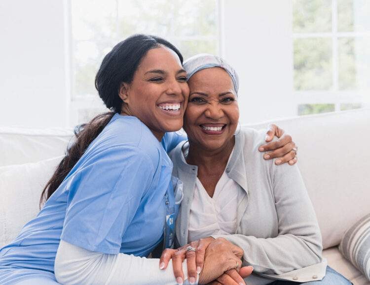 Caregiver assisting an elderly client at home