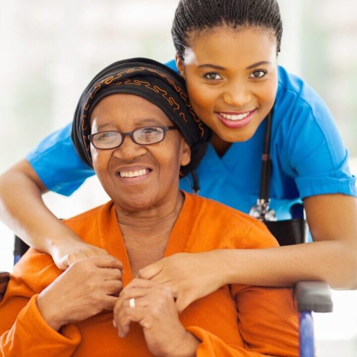 22198045 - portrait of senior african disabled woman and her caregiver